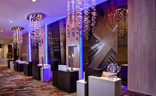 Pre-function foyer with sculptural glass chandeliers